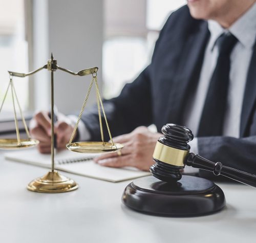 judge-gavel-with-justice-lawyers-counselor-in-suit-or-lawyer-working-with-contract-papers-on-a_t20_jLnxJv
