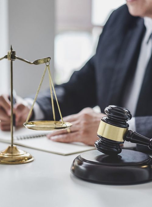 judge-gavel-with-justice-lawyers-counselor-in-suit-or-lawyer-working-with-contract-papers-on-a_t20_jLnxJv